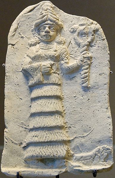 Ishtar holding her symbol